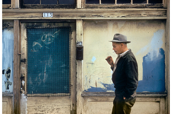 Fred Herzog, Man Walking with Blue Door, 1959